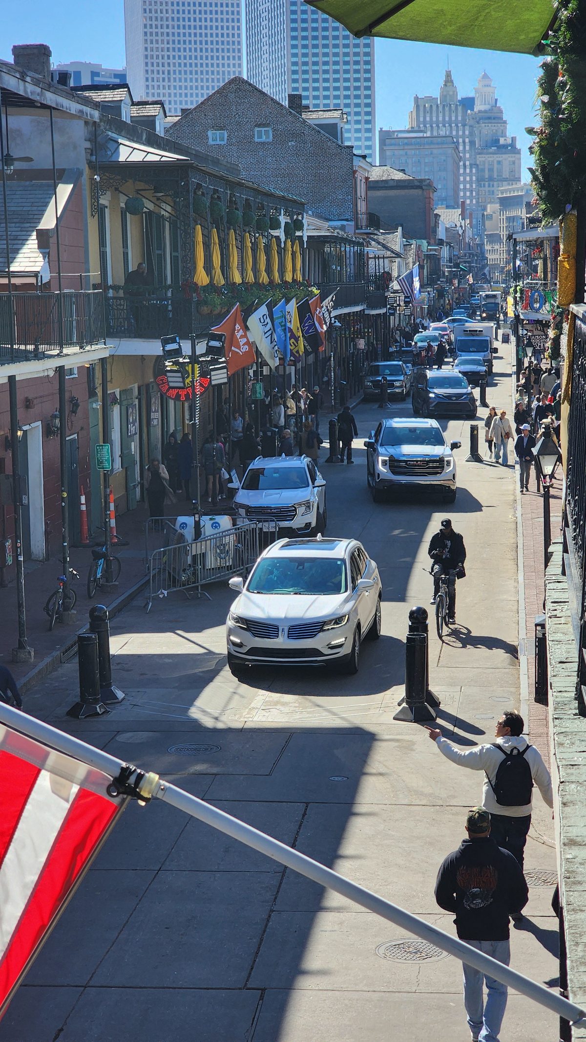Looking down Bourbon Street in New Orleans from a balcony