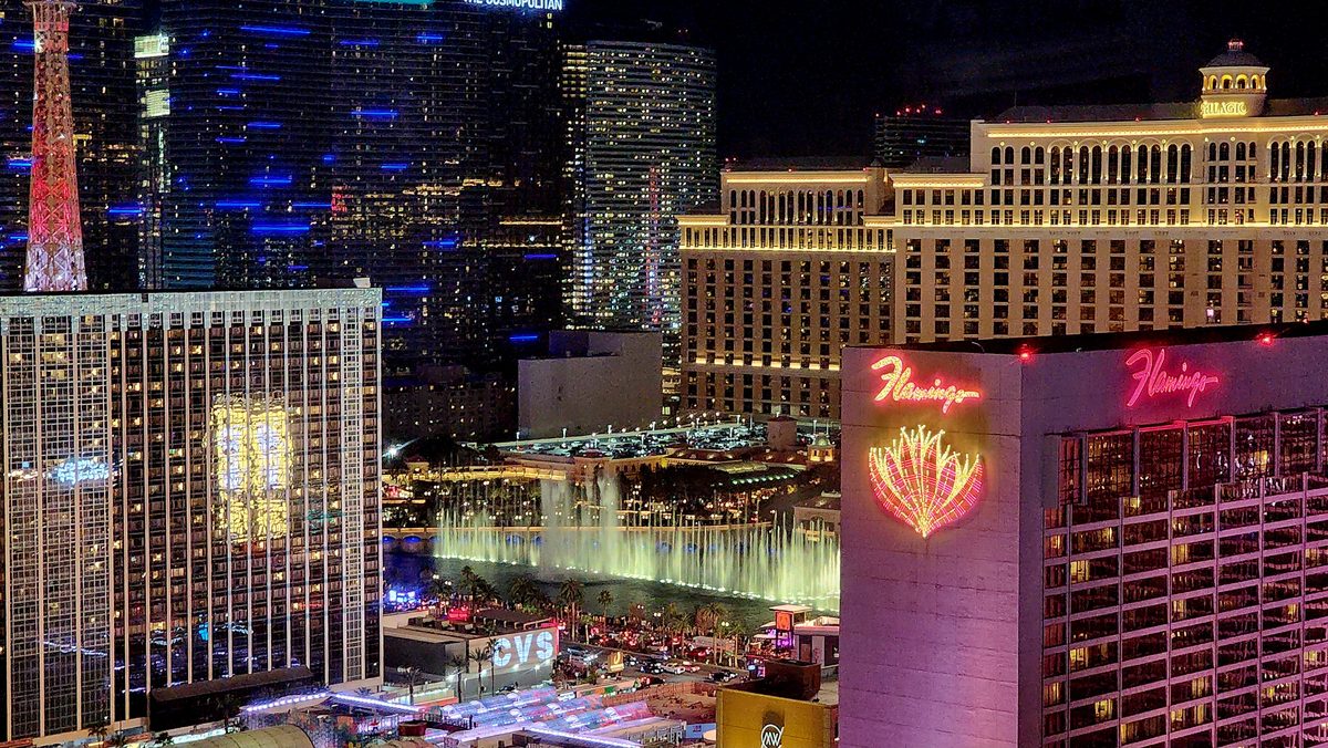 The Las Vegas Strip and Bellagio fountains lit up at night