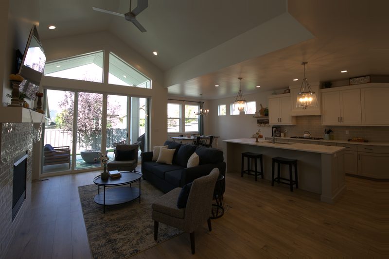 The same room straight out of the camera: dark corners, gray floors and blown-out windows
